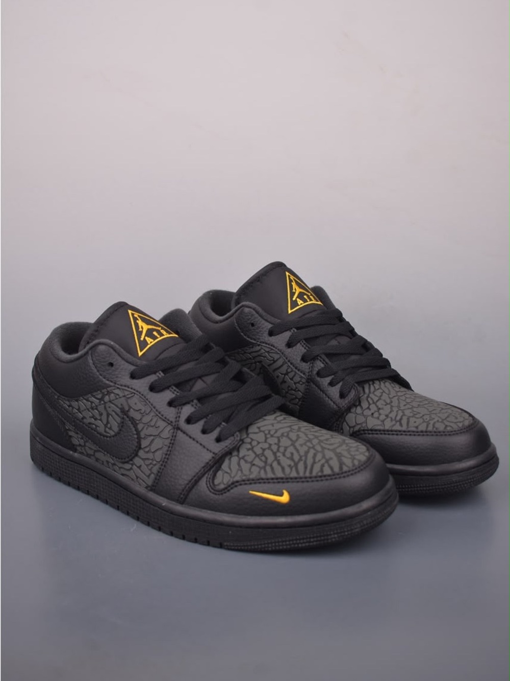 Nike Black Low-Top Sneakers with Yellow Accents